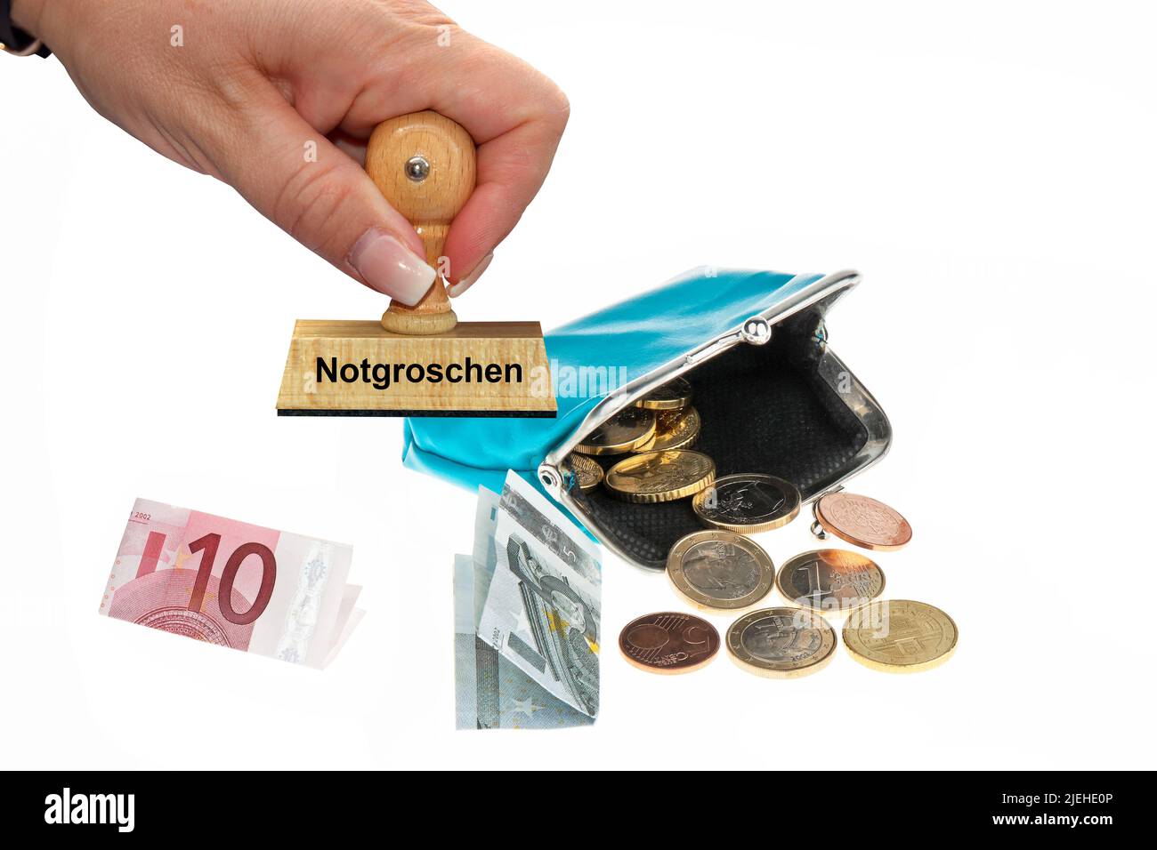 Eine Geldbörse mit Euro-Geldscheinen und Münzen, Notgroschen, Armut, Mindesteinkommen, Pleite, Stock Photo