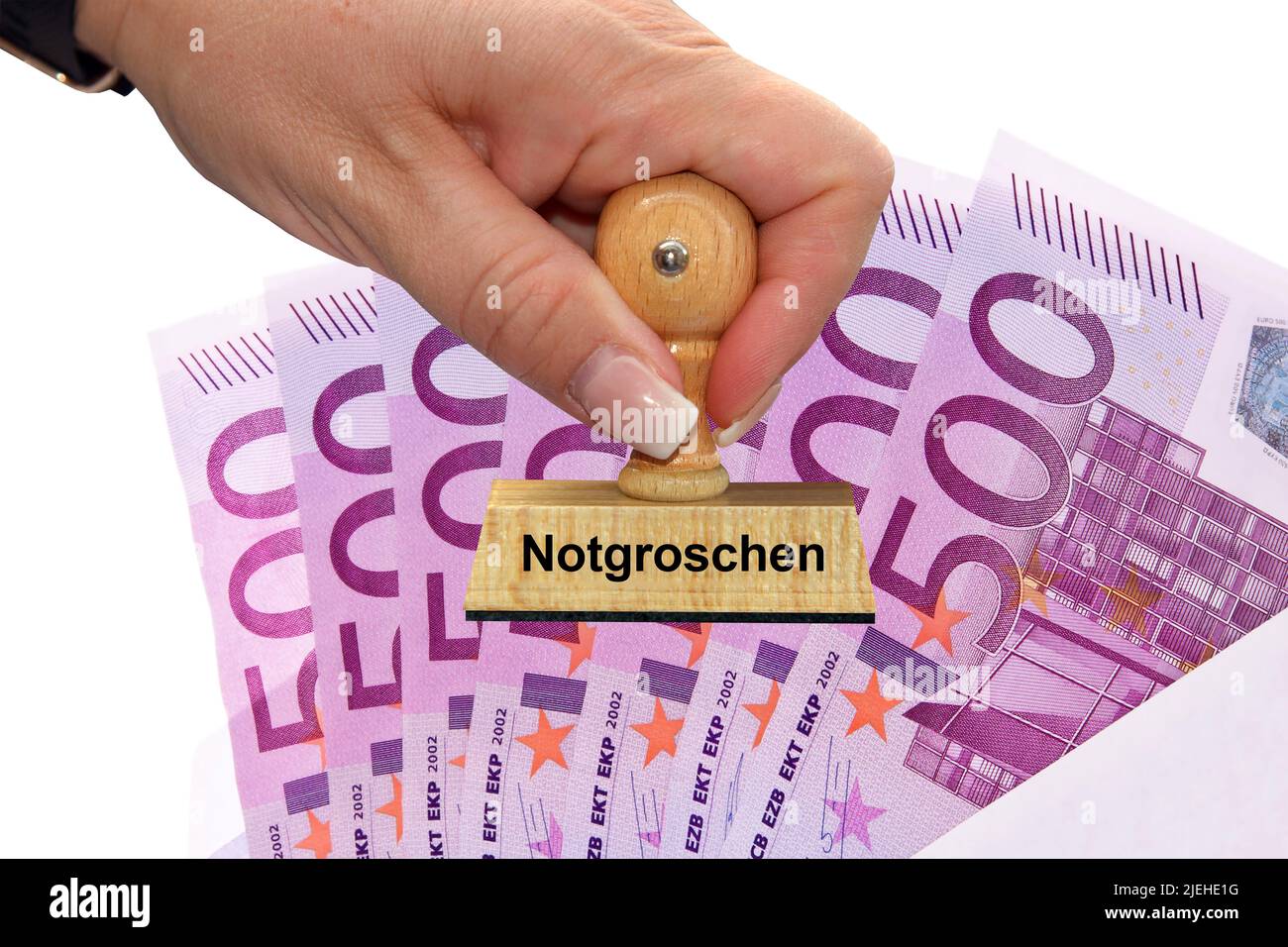 Viele 500 Euro-Banknoten im Briefumschlag, Notgroschen, Stempel, Holzstempel, Frauenhand, Stock Photo