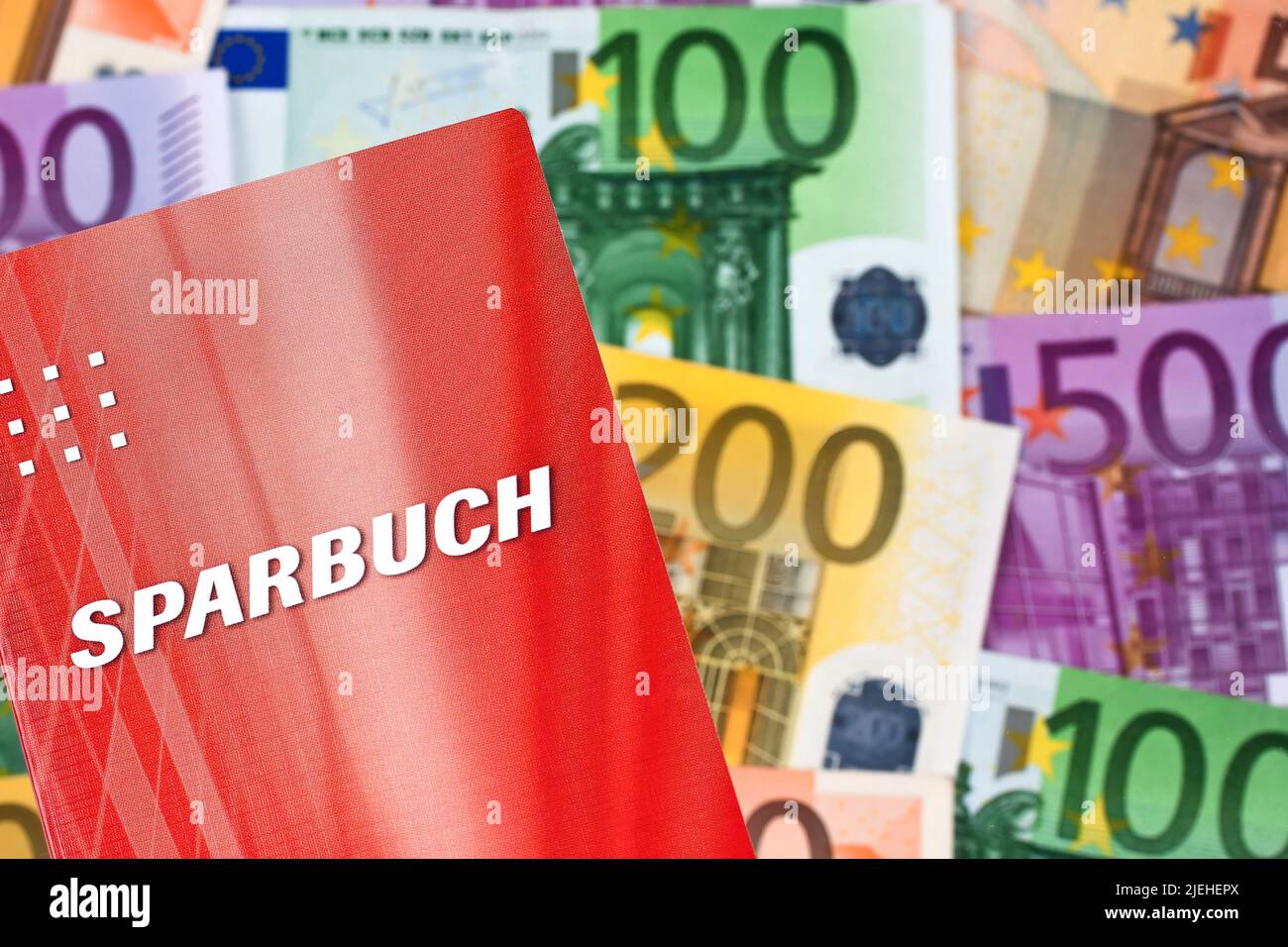 Ein Sparbuch mit Euro-Banknoten, Sparen, Reserve, Vorsorge, Altersvorsorge, Notgroschen, Rücklage, Stock Photo