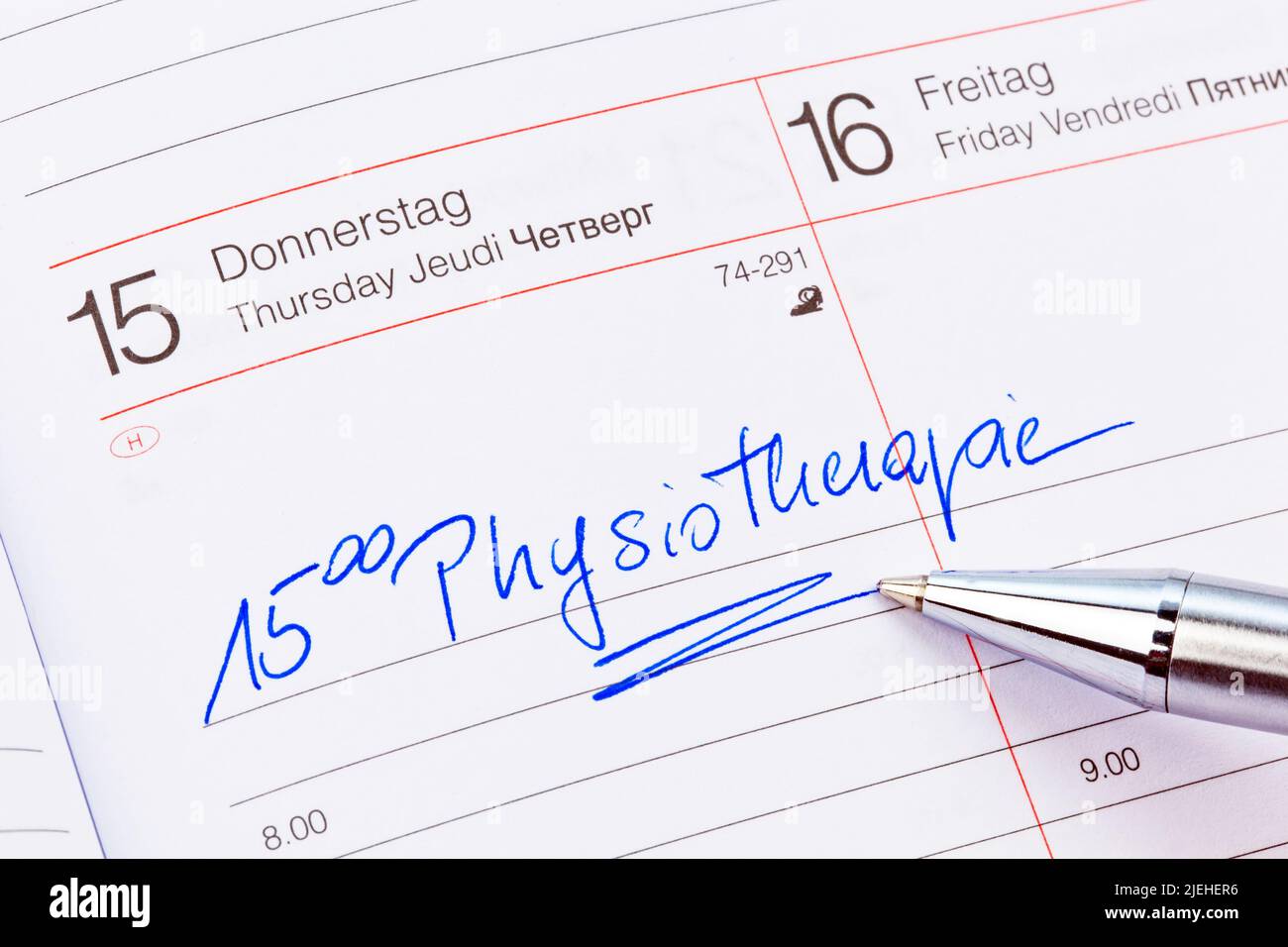 Ein Termin ist in einem Kalender eingetragen:  Physiotherapie Stock Photo