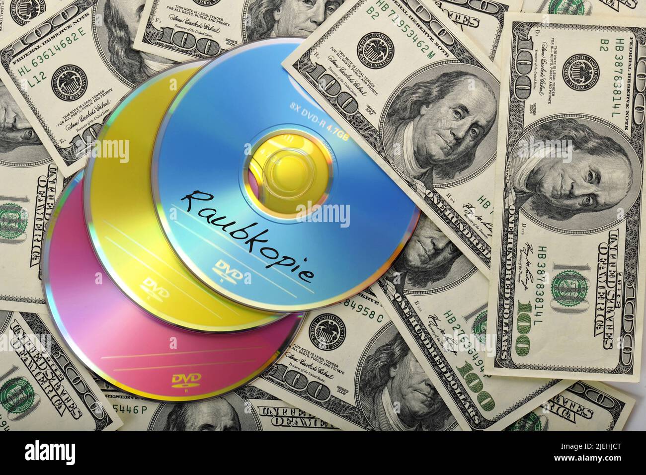 Banknoten, CD, DVD, Datenschutz, Steuerhinterziehung, Raubkopien, Steuerflucht, Schwarzgeld, Auslandskonten, US-Dollars, Stock Photo