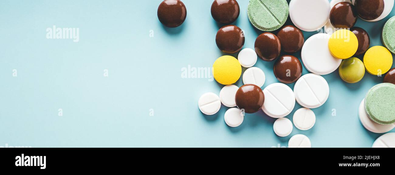 Blue banner with various pills. Stock Photo