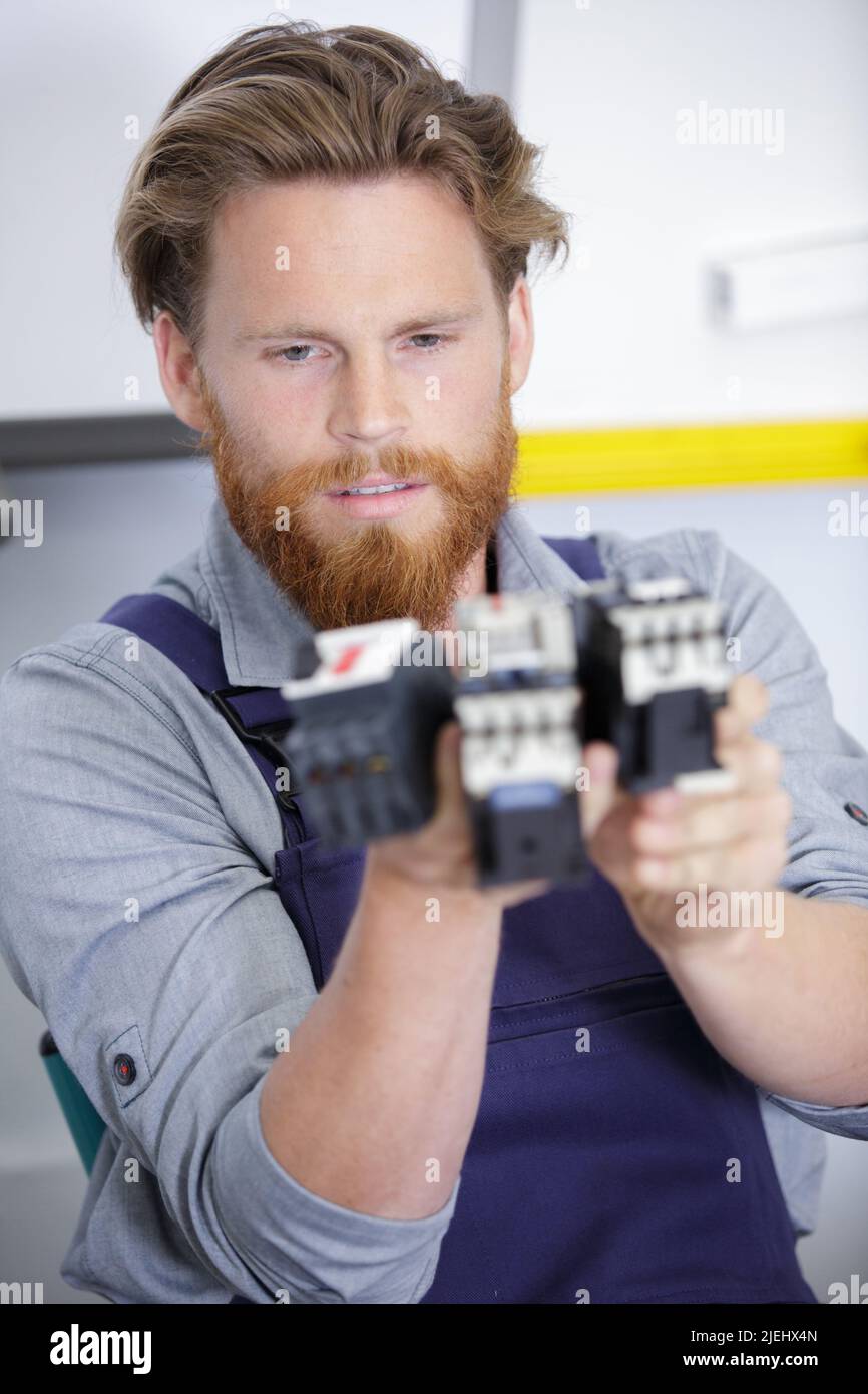 a supervisor doing quality control Stock Photo - Alamy