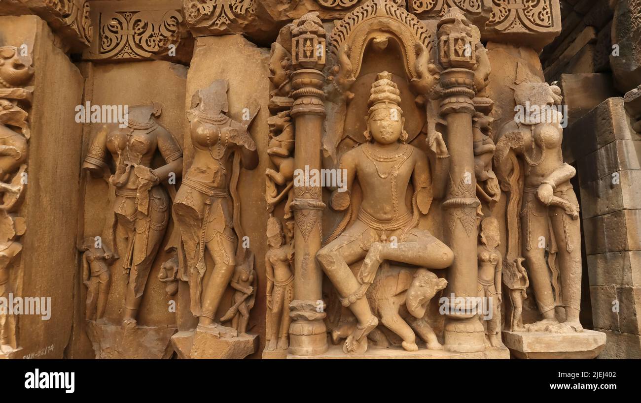 Lord Shiva and other sculptures, Kakanmath temple, Morena, Madhya Pradesh, India. Kakanmath temple is a 11th century Shiva temple built by the Kachchh Stock Photo