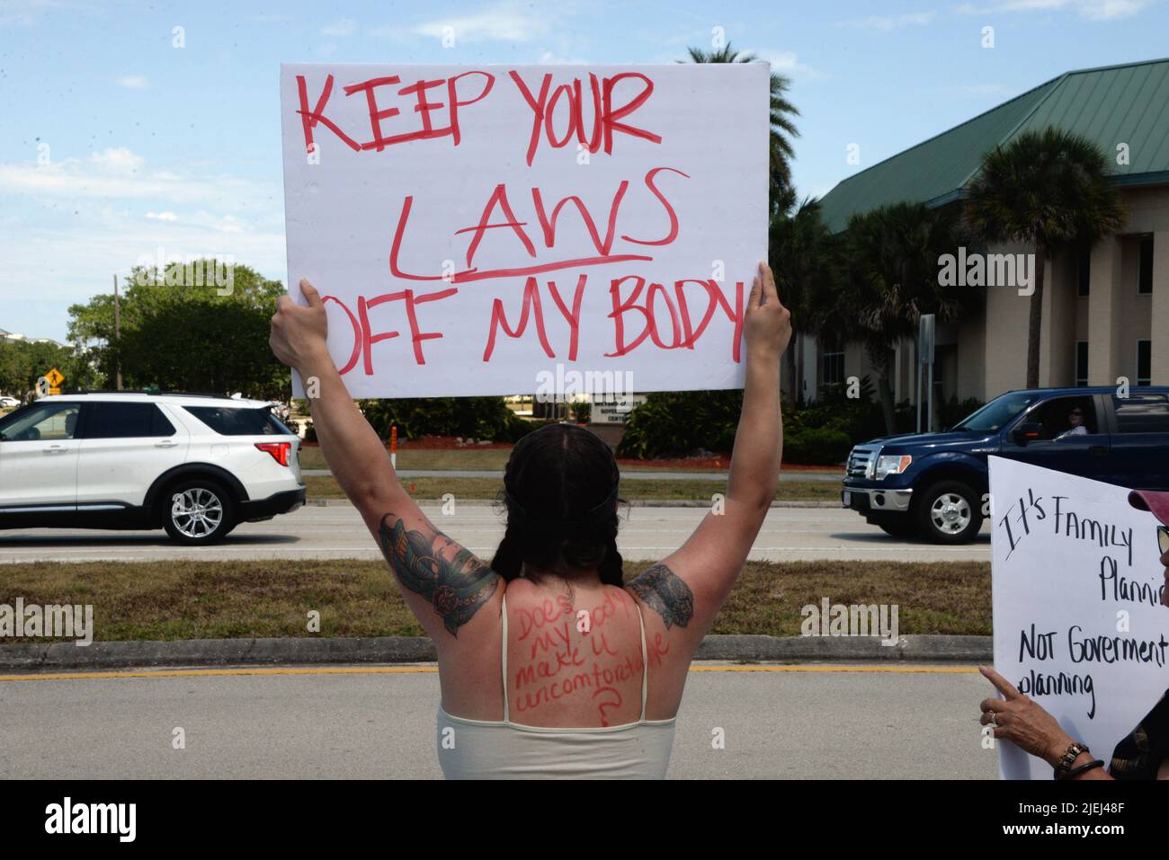 Viera. Brevard County. Florida. USA. May 14, 2022. A “Bans Off Our Bodies” rally was held in front of the Moore Justice Center. All kinds of signs were being waved at the passing motorists who responded with honking horns and a few gestures. This is all in response to the US Supreme Courts leaked opinion to eliminate Roe V Wade. Credit: Julian Leek/Alamy Live News Stock Photo