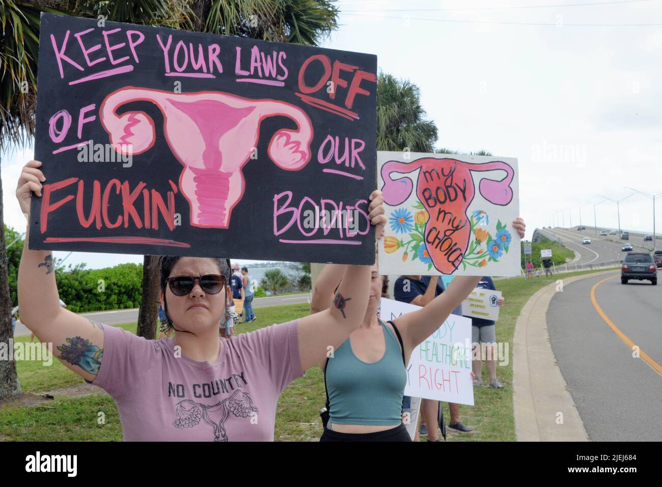 Melbourne, Brevard County, Florida, USA. June 26, 2022. Protesters against the Supreme Court of the Unites States (SCOTUS) decision to overturn Roe v. Wade gathered on the Eau Gallie Causeway FOR a women's rally for reproductive rights and people with uteruses! Credit: Julian Leek/Alamy Live News Stock Photo