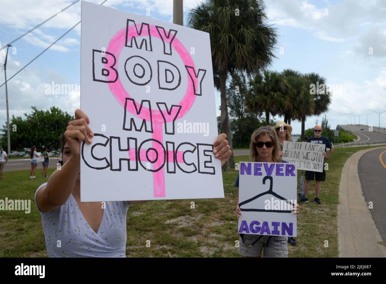 Melbourne, Brevard County, Florida, USA. June 26, 2022. Protesters against the Supreme Court of the Unites States (SCOTUS) decision to overturn Roe v. Wade gathered on the Eau Gallie Causeway FOR a women's rally for reproductive rights and people with uteruses! Credit: Julian Leek/Alamy Live News Stock Photo