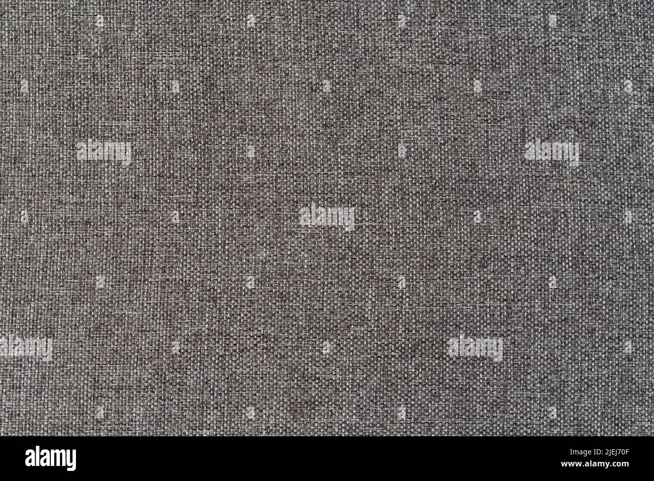 close-up of rough linen fabric, full frame cloth background Stock Photo