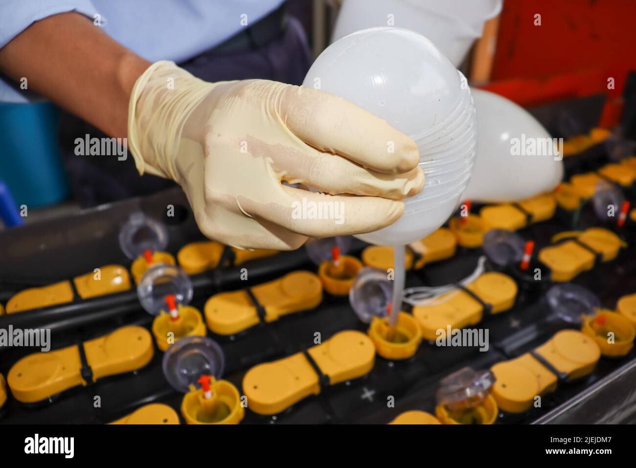 Adjust the battery distilled water level Stock Photo Alamy