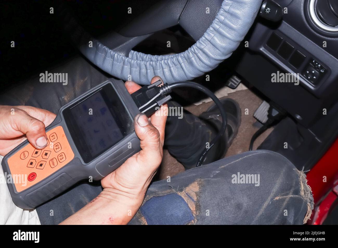 Mechanics are using auto diagnostic tools Stock Photo Alamy