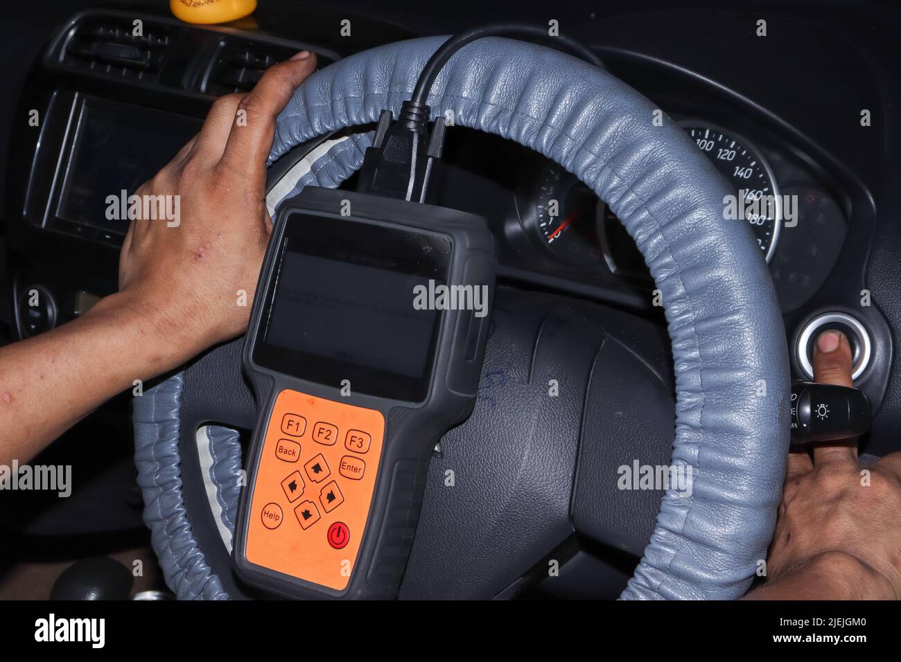 Mechanics are using auto diagnostic tools Stock Photo Alamy