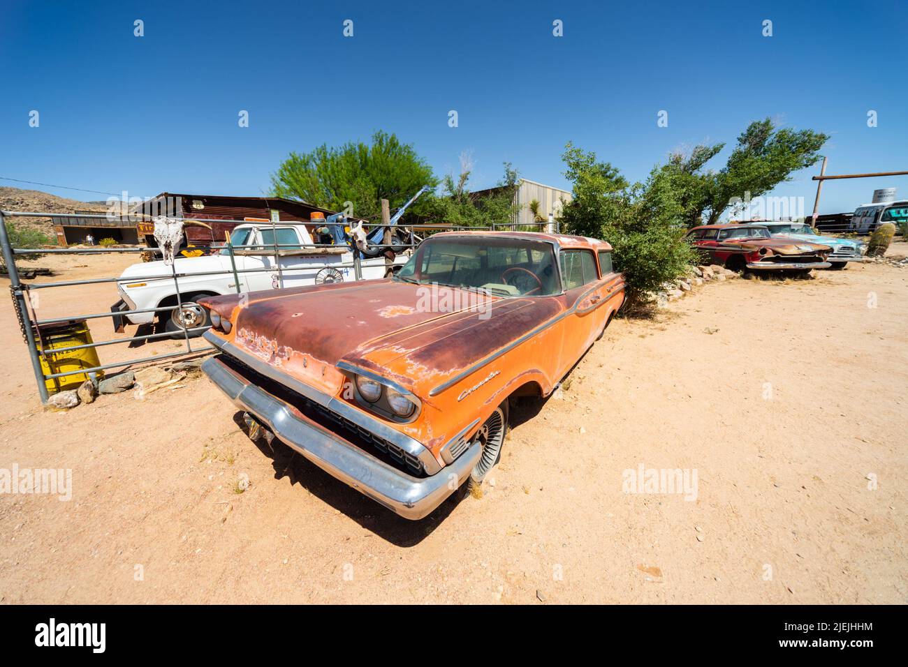 Classic Mercury Commuter car with faded orange paintwork, Hackberry General Store, Hackberry, AZ, USA. Route 66 Arizona Stock Photo