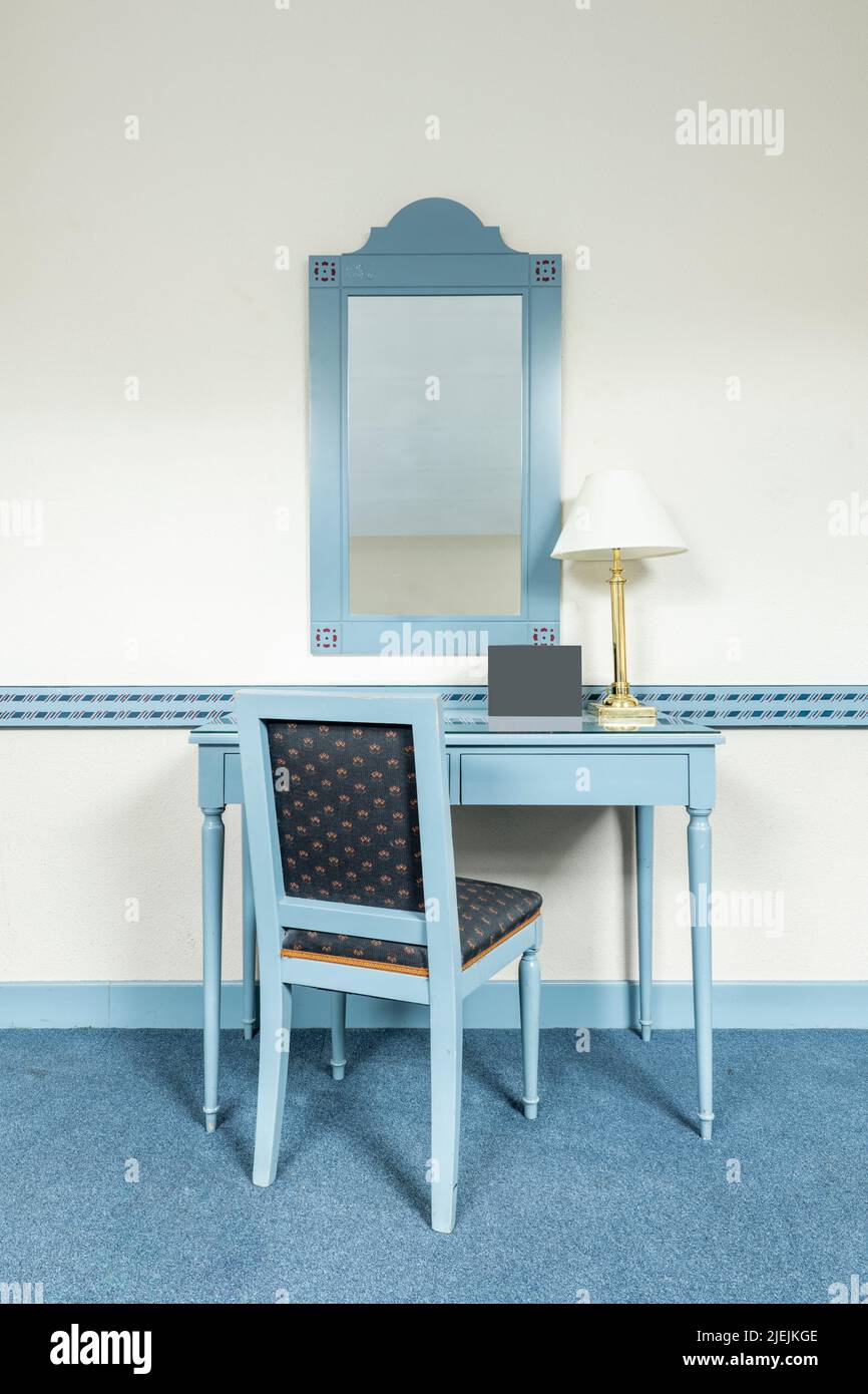 Vintage blue painted desk with matching mirror, upholstered chair
