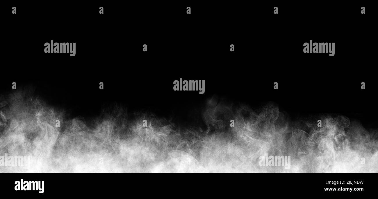 Very small drops of steam in chaotic motion on a black background Stock Photo