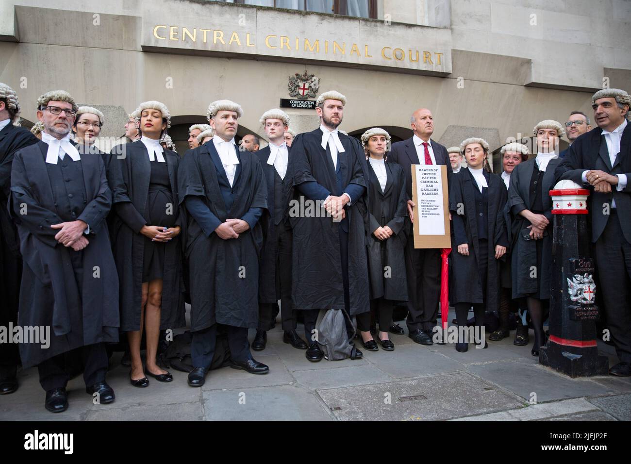 London ,United Kingdom  -27/06/2022. Criminal Barristers are seen striking as they picket outside London’s Old Bailey as they dispute pay and conditio Stock Photo