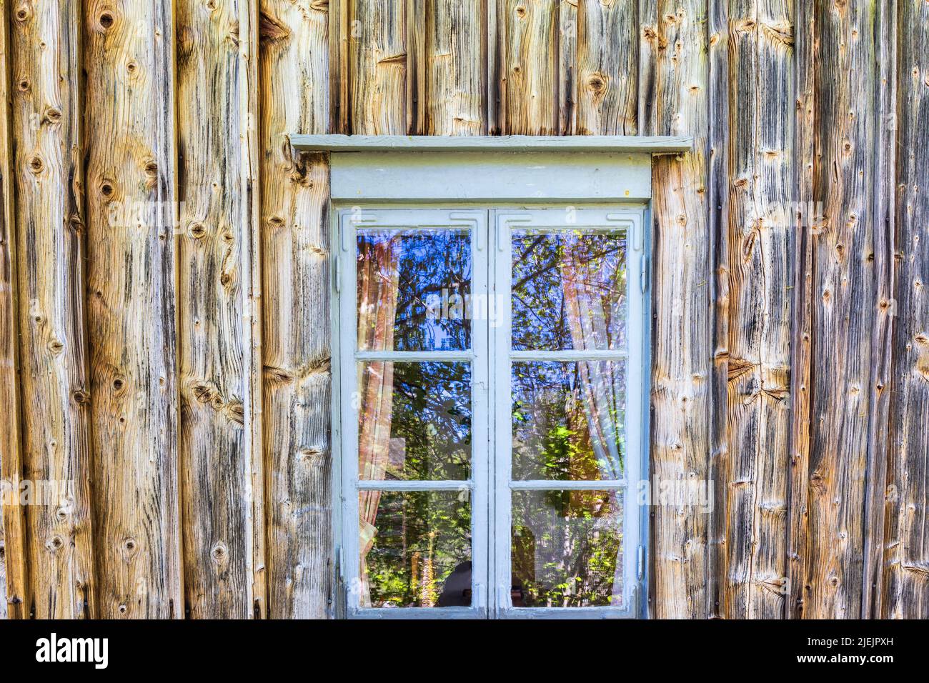 Window on an old cottage with unpainted wooden wall Stock Photo - Alamy