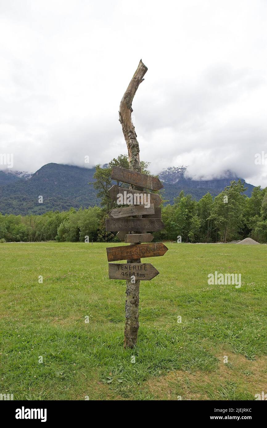 Locality Signs Direction signs at the Peulla locality, on the Lake Todos Los Santos ...