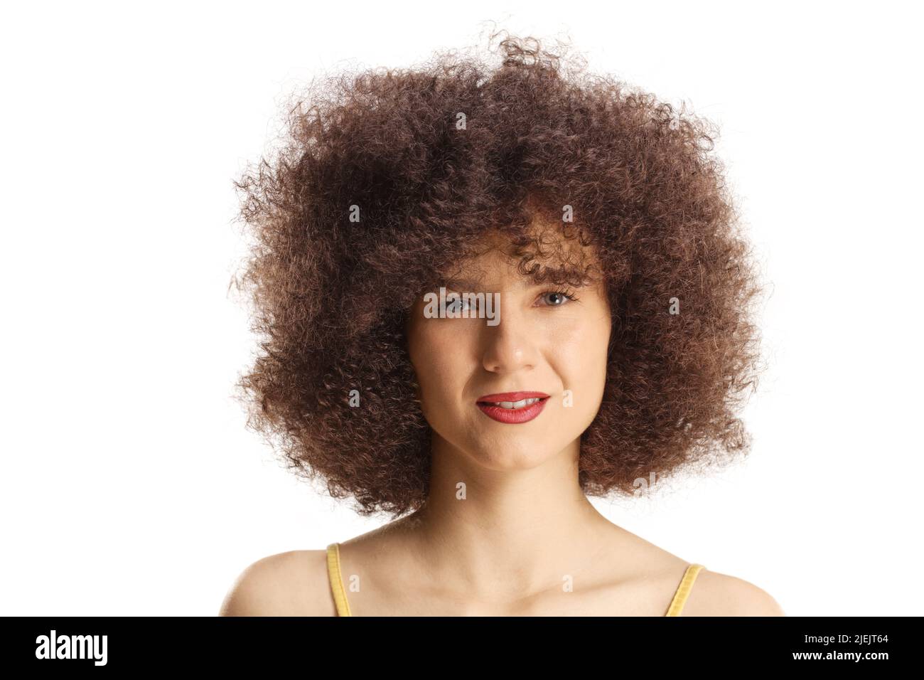 Close up portrait of a young caucasian woman with afro hairstyle isolated on white background Stock Photo