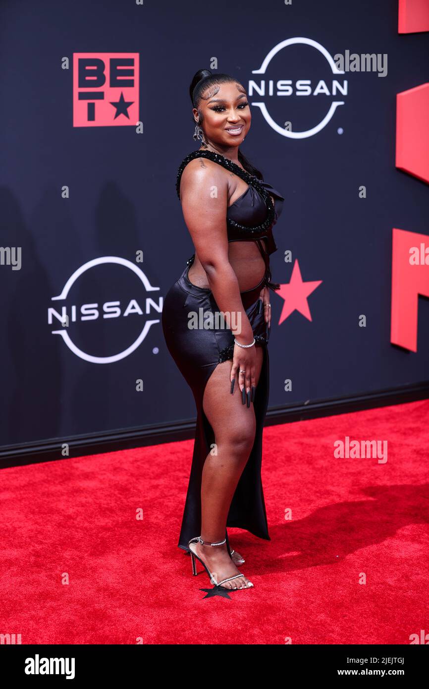 LOS ANGELES, CALIFORNIA, USA JUNE 26 Erica Banks arrives at the BET