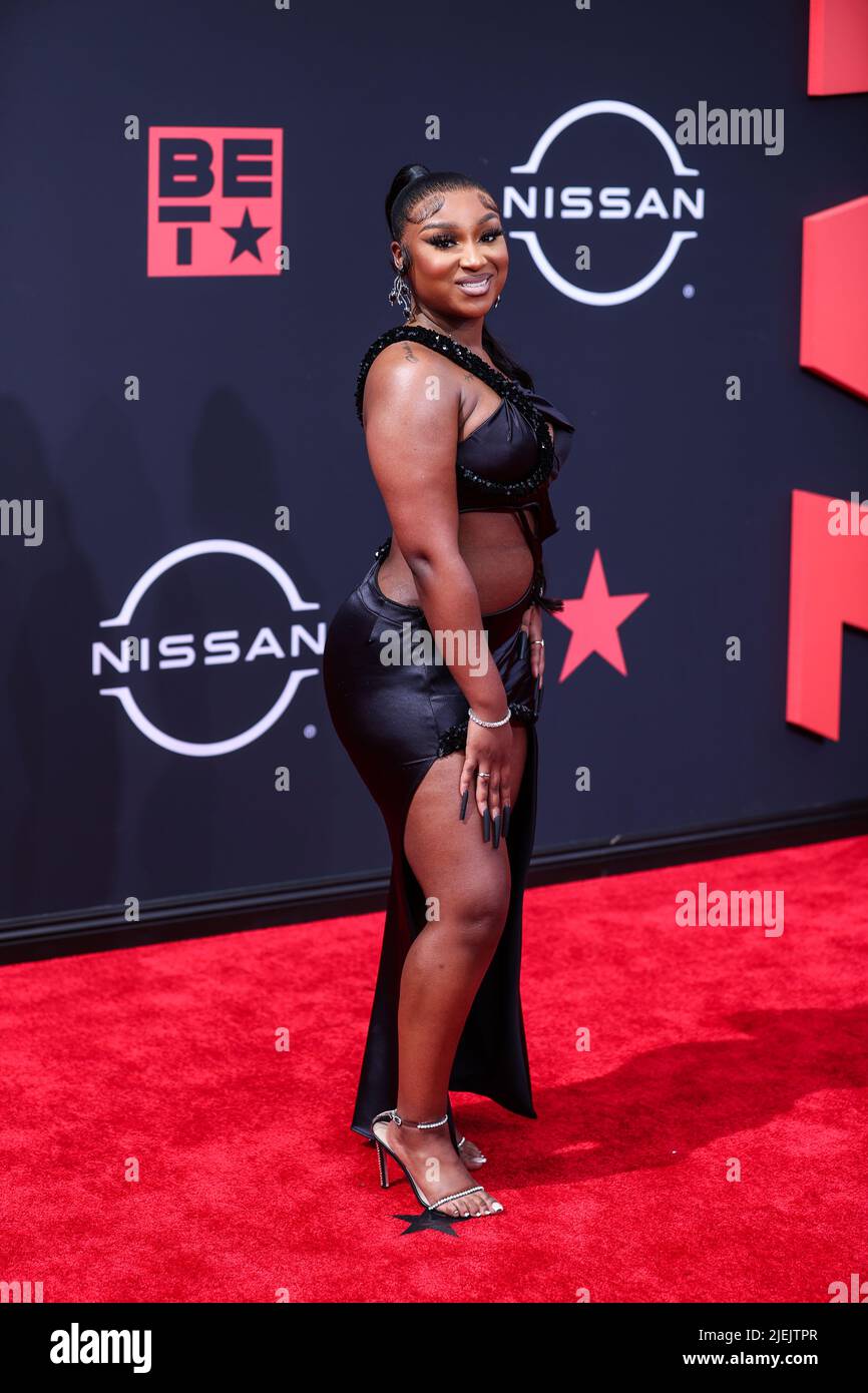 LOS ANGELES, CALIFORNIA, USA JUNE 26 Erica Banks arrives at the BET