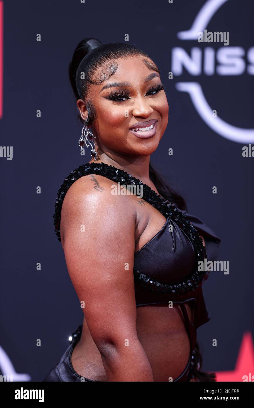 LOS ANGELES, CALIFORNIA, USA JUNE 26 Erica Banks arrives at the BET