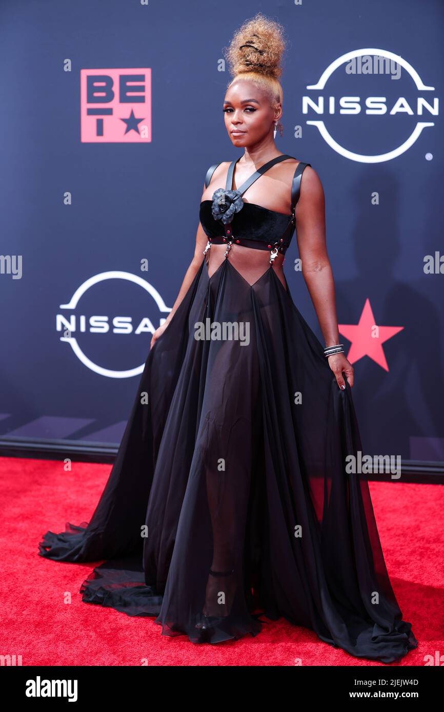 Wearing a roberto cavalli dress hi-res 