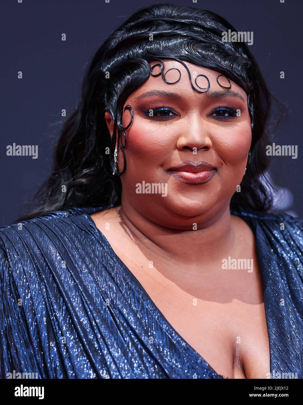LOS ANGELES, CALIFORNIA, USA - JUNE 26: American singer Lizzo wearing a custom Gucci feathered gown arrives at the BET Awards 2022 held at Microsoft Theater at L.A. Live on June 26, 2022 in Los Angeles, California, United States. (Photo by Xavier Collin/Image Press Agency) Credit: Image Press Agency/Alamy Live News Stock Photo