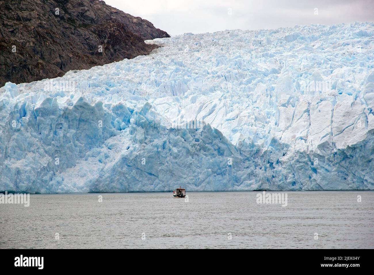 Boat in front of the San Rafael Glacier, Patagonia Chile. It is one of