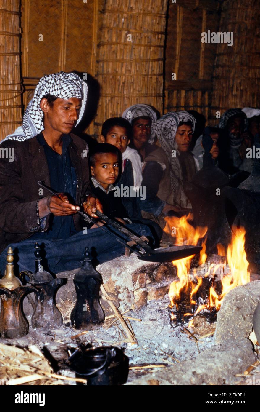 Iraq Cooking On Open Fire - Marsh Arab Stock Photo