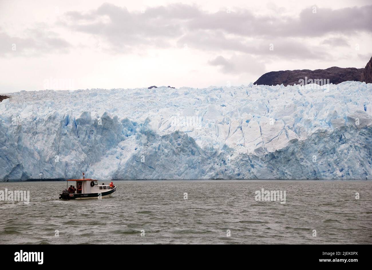 Boat in the San Rafael Lagoon with theSan Rafael Glacier in the