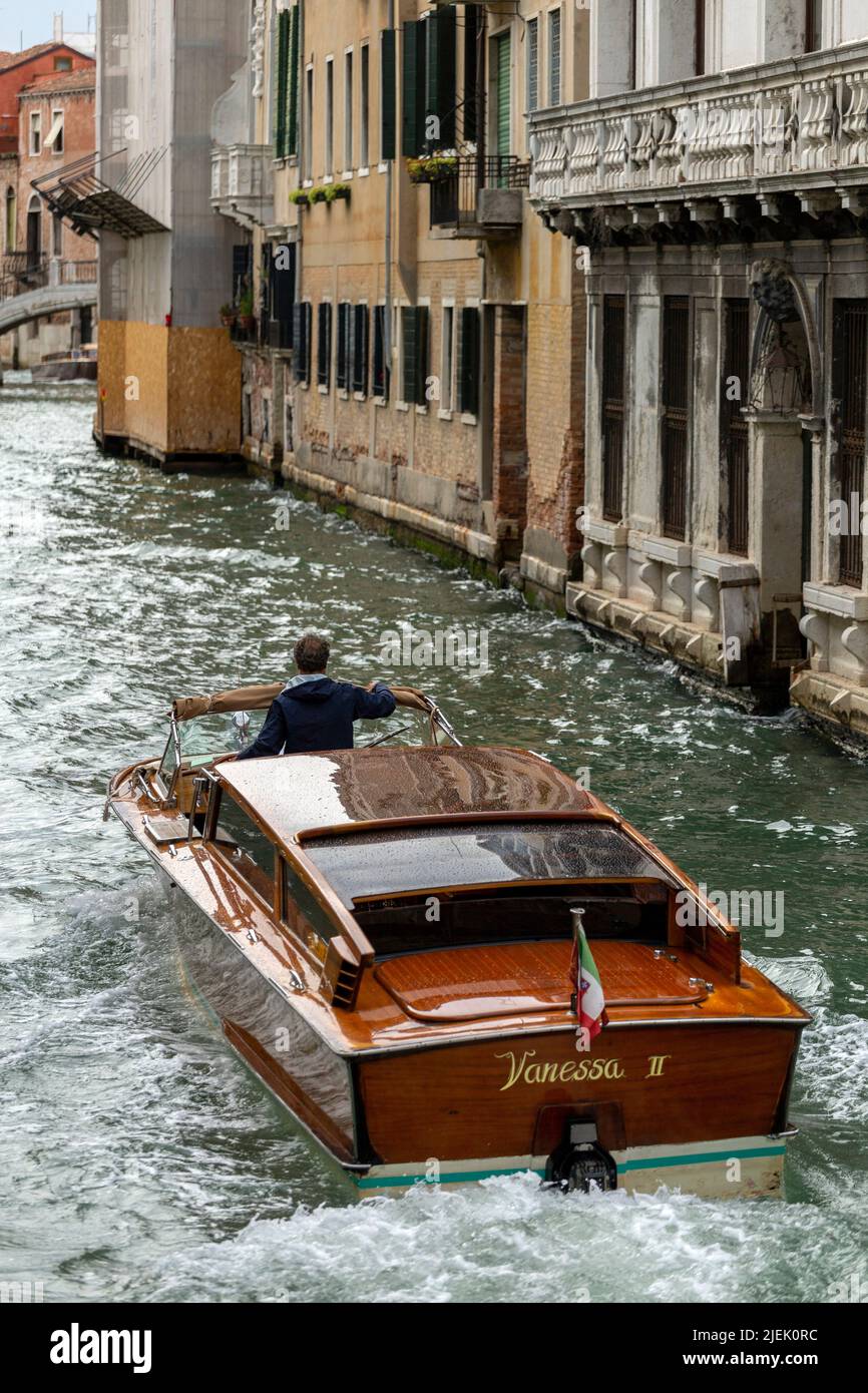 Venice, Italy - 06 09 2022: Classic wood boat in the city of Venice on a  summer day Stock Photo - Alamy