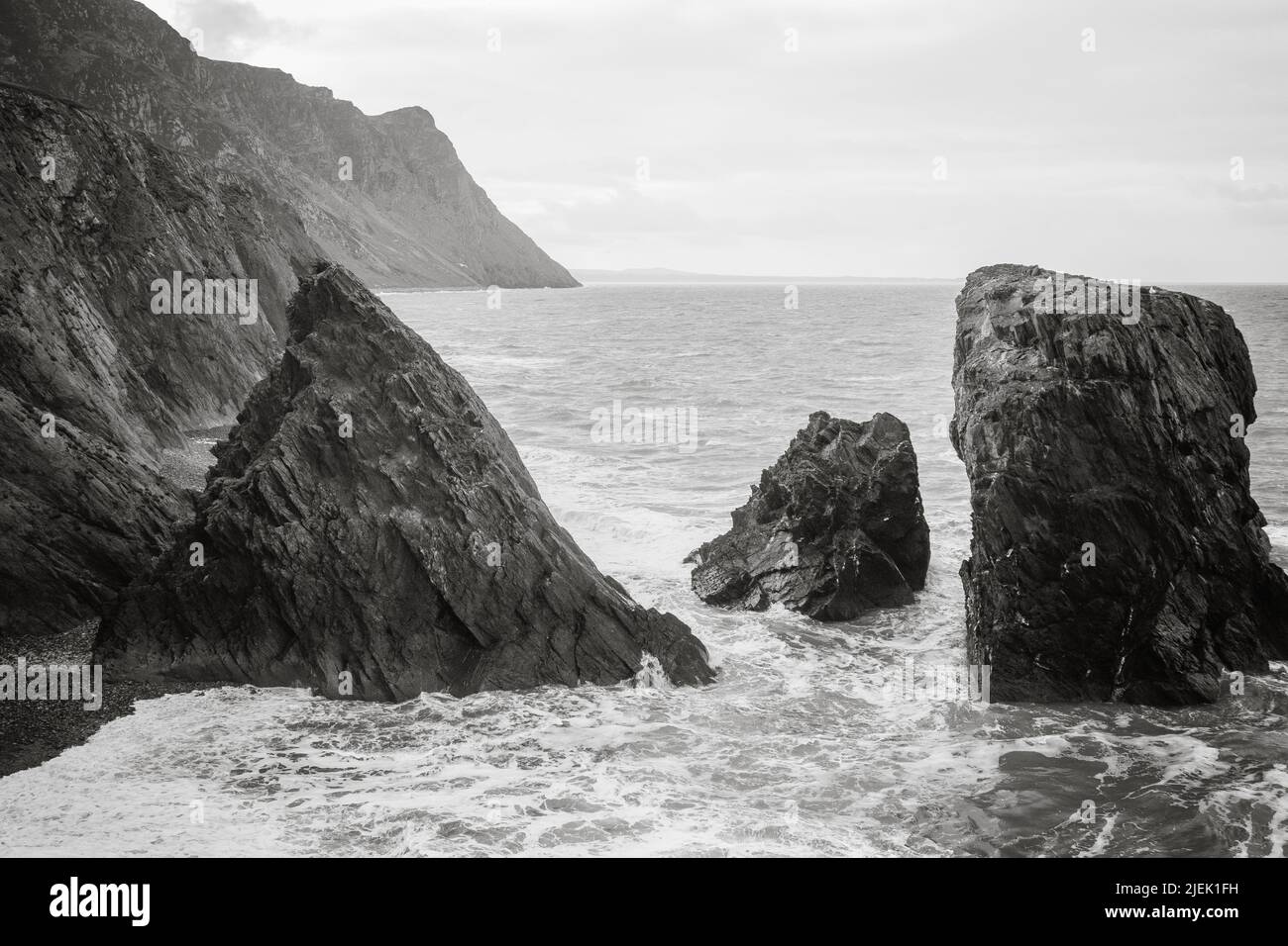 Trefor Seastack & Stormy Seas Watching from Cliffs above Stock Photo