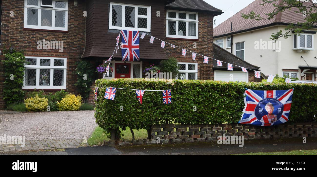 House Decorated with Union Jack Bunting for Queen Elizabeth II Platinum Jubilee Surrey England Stock Photo