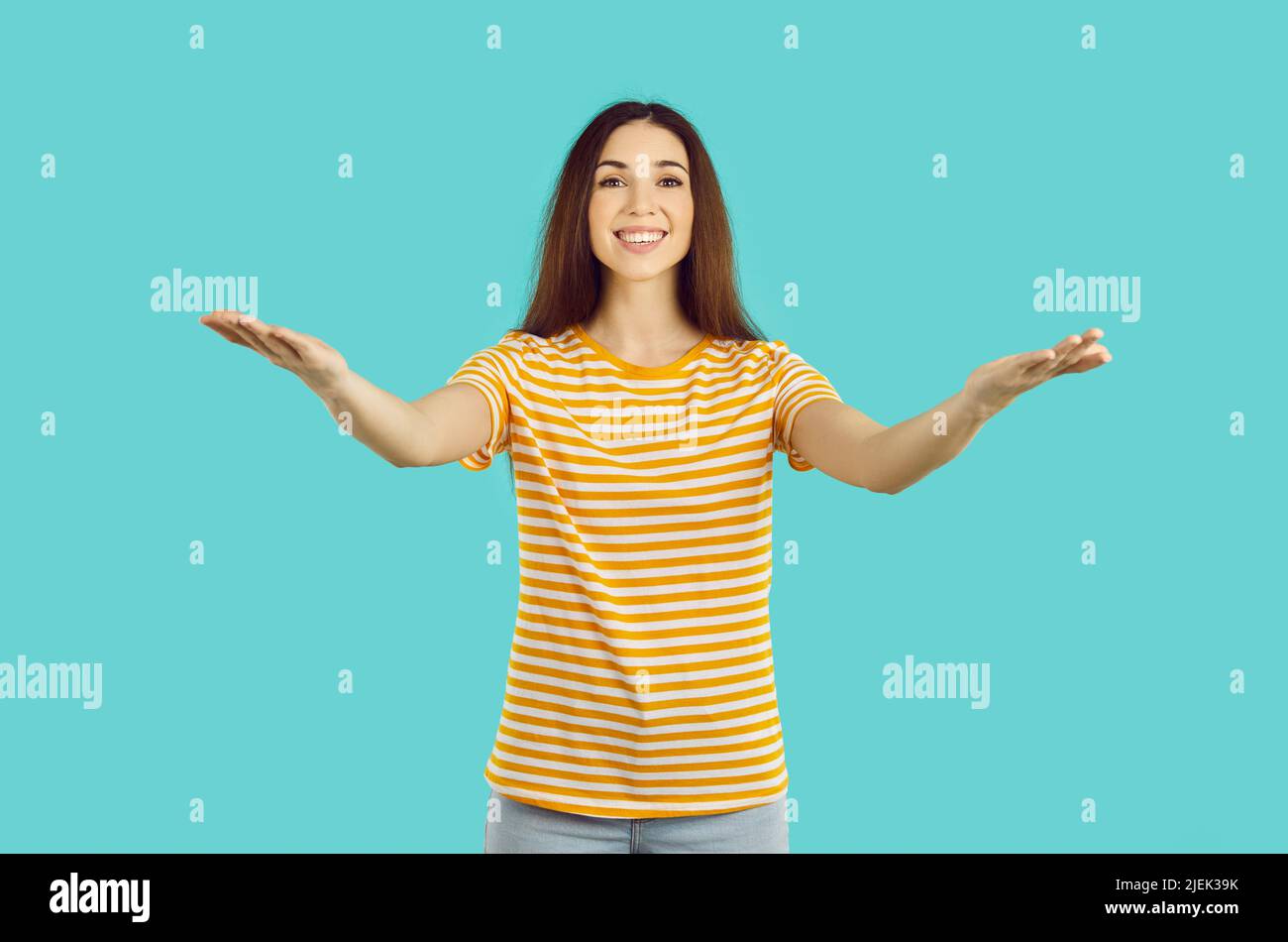 Smiling woman stretch hands to camera Stock Photo