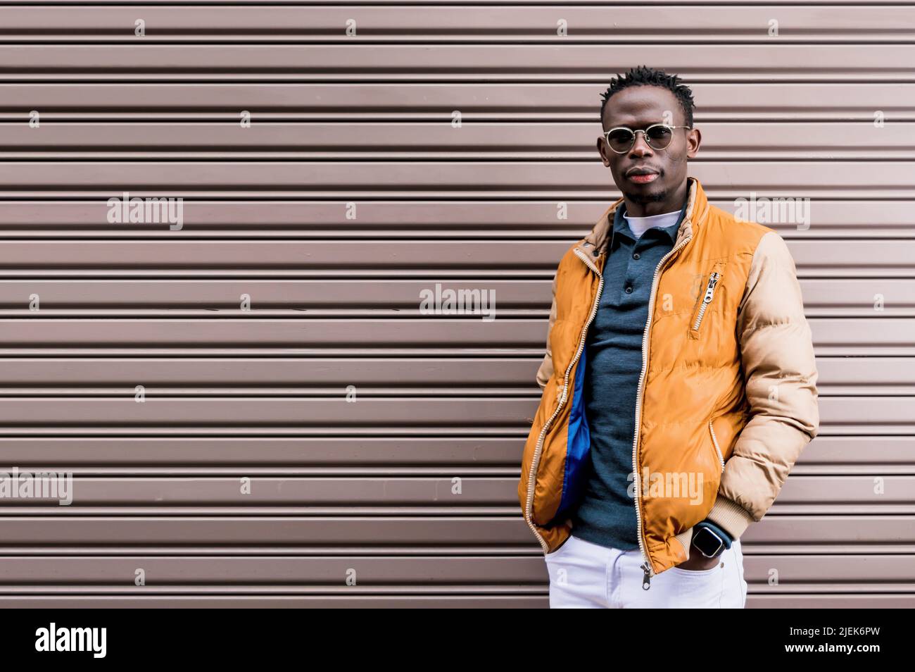 Mustard color jacket hi-res stock 