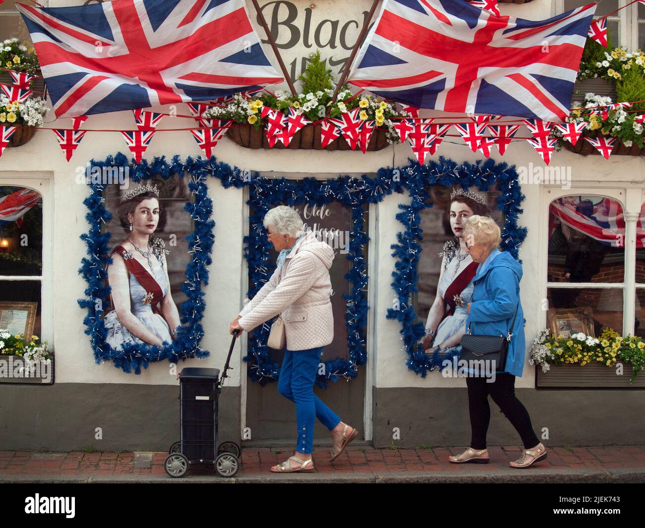 A pub in the village of Rottingdean is festooned with flags for the