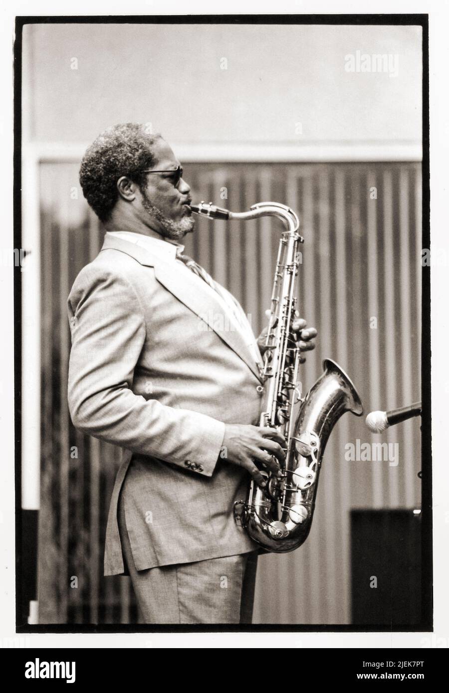 Tenor Saxophonist Clifford Jordan performs at an outdoor concert at the Brooklyn Museum In New York City. From the early 1980s. Stock Photo