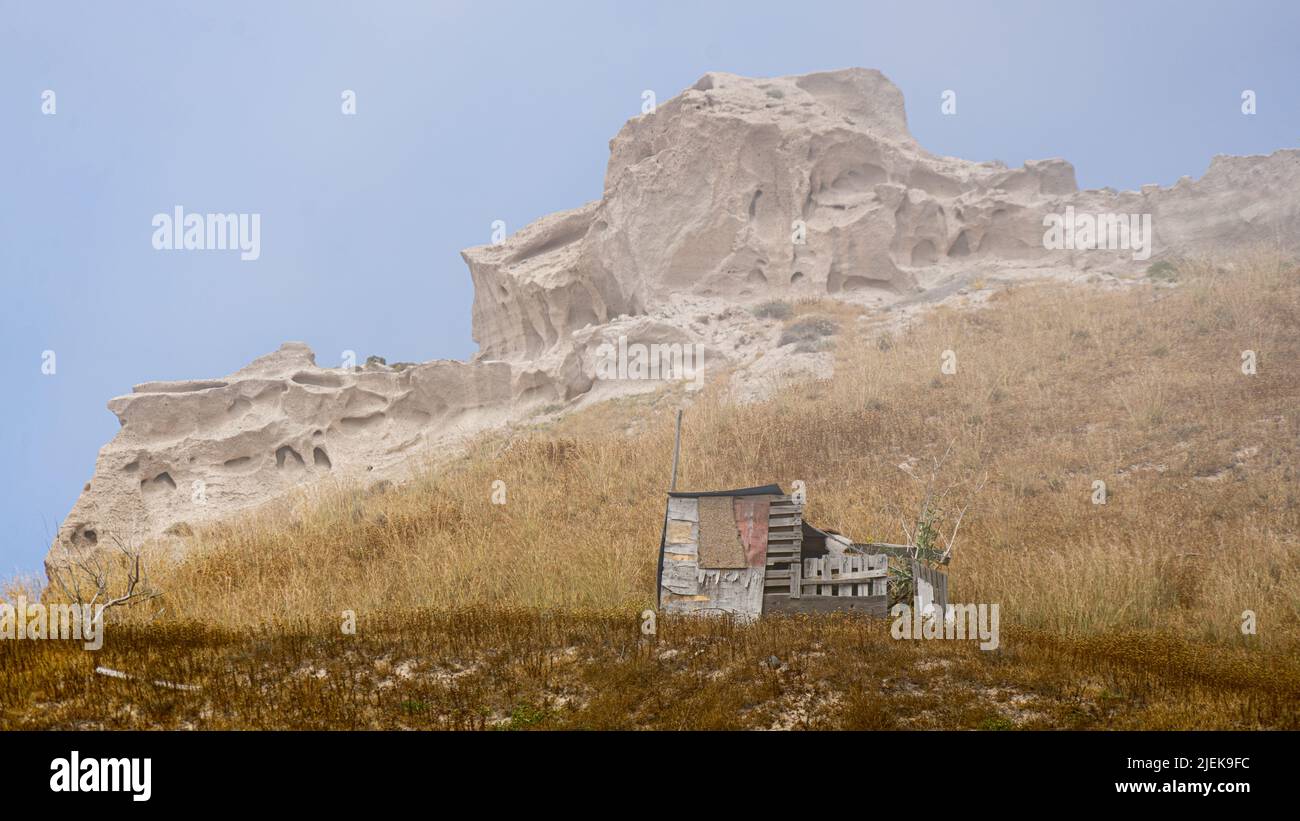 Santorini: Lunar landscape formed by eroded pumice cliffs on Moon Beach near Vlychada Stock Photo