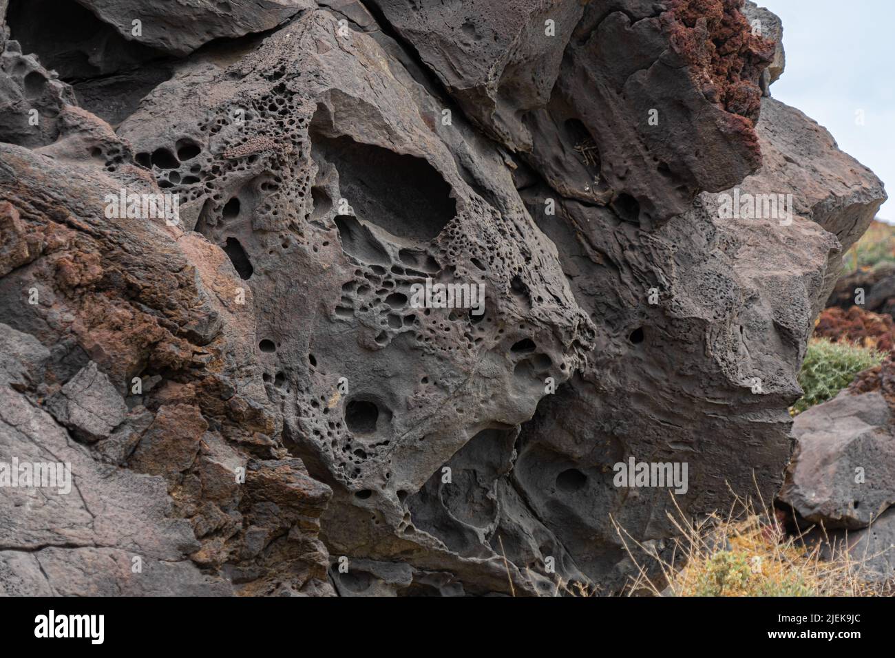 Santorini: Lunar landscape formed by eroded pumice cliffs on Moon Beach near Vlychada Stock Photo