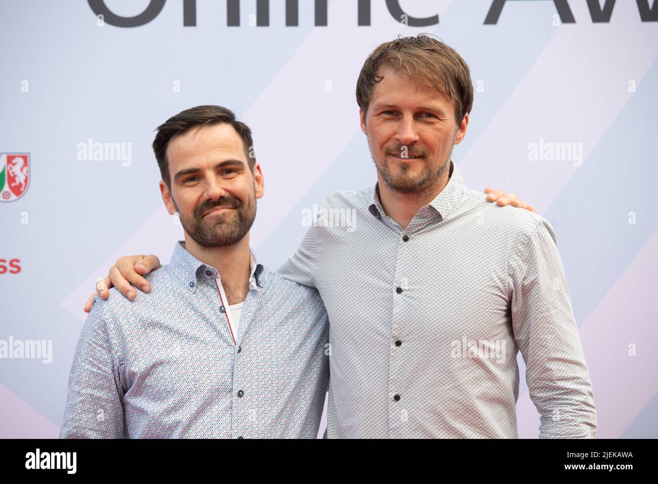 Cologne, Deutschland. 23rd June, 2022. left to right Sascha COLLET, graphic designer, Michael SCHOENHERR, SchÃ¶nherr, red carpet, Red Carpet Show, presentation of the Grimme Online Awards 2022 on June 23, 2022 in the Flora Koeln, Â Credit: dpa/Alamy Live News Stock Photo