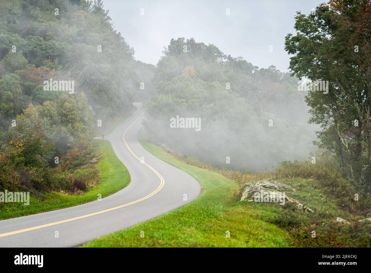 Blue Ridge Parkway road, North Carolina fall foliage mountains national park forest with fog
