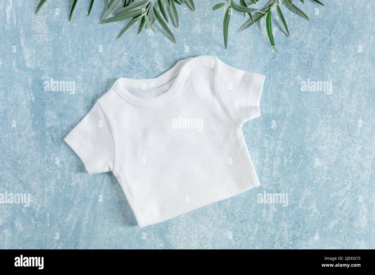 white baby clothes, newborn baby costume mockup Stock Photo