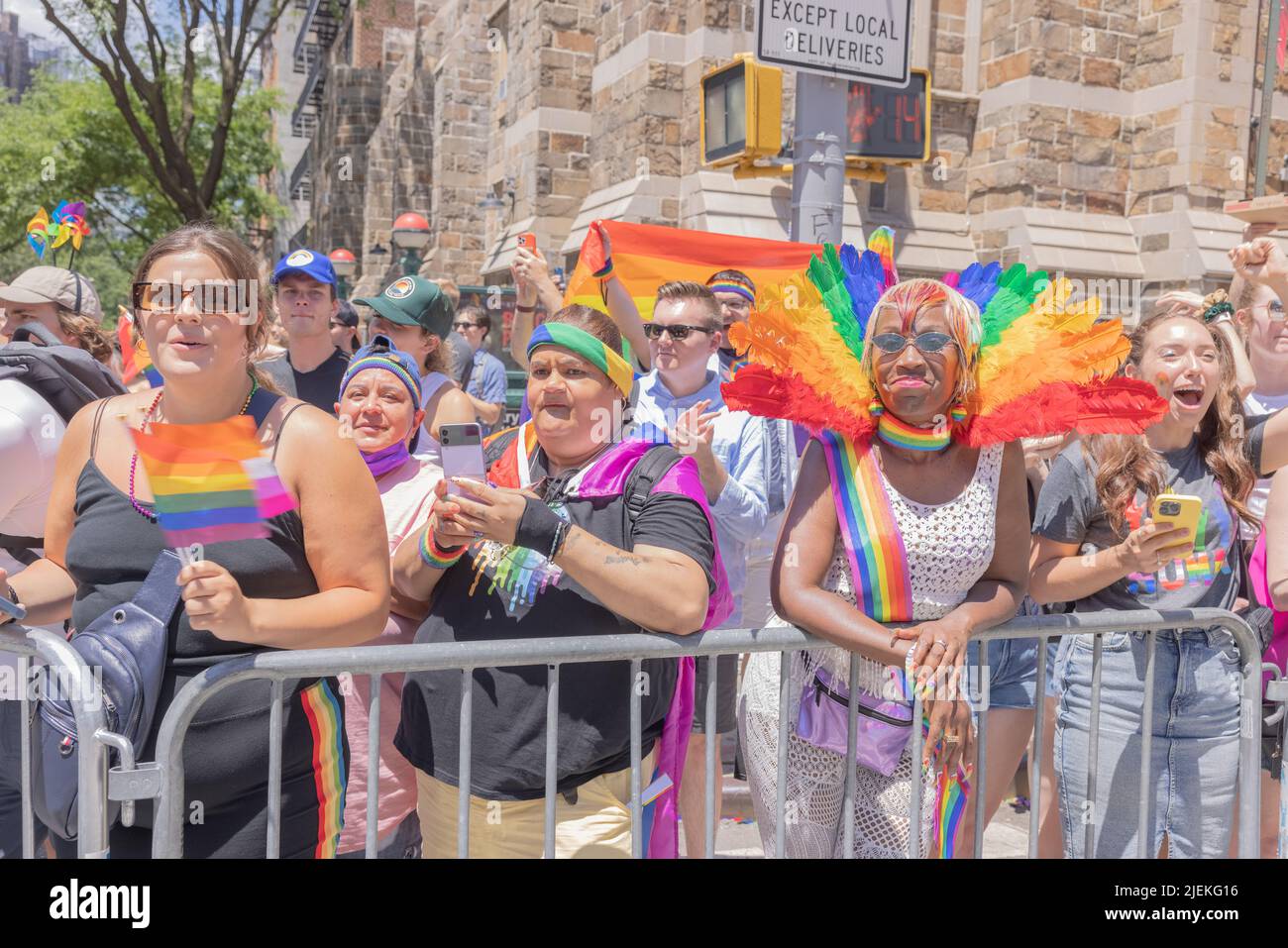 NEW YORK, N.Y. – June 26, 2022: Spectators are seen at the 2022 NYC Pride March in Manhattan. Stock Photo