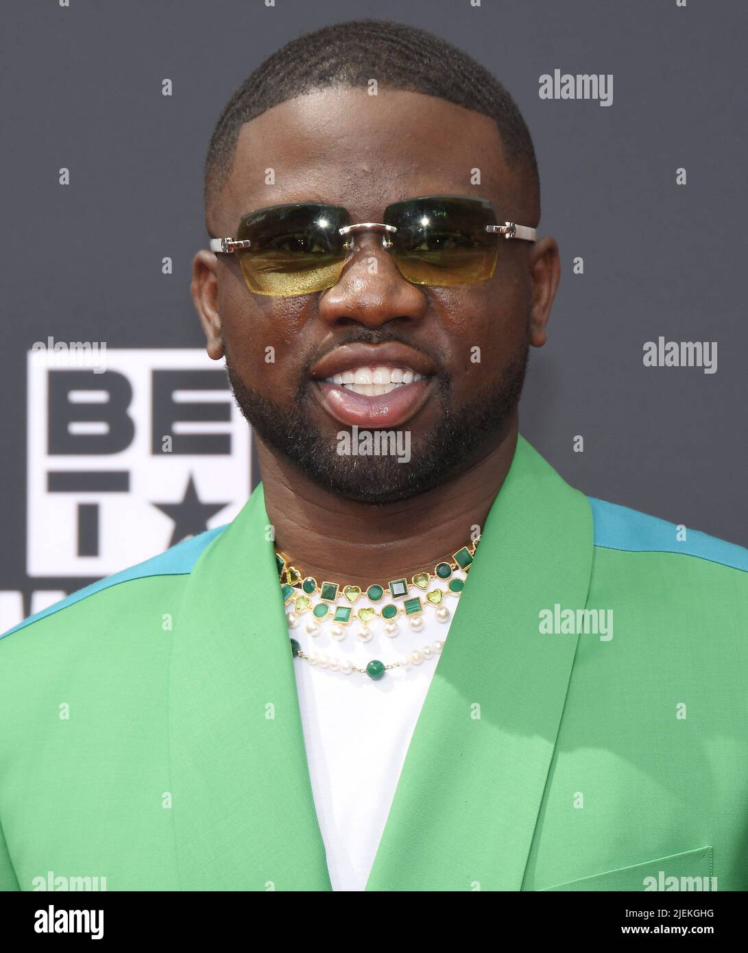 Luke Lawal arrives at the BET Awards 2022 held at the Microsoft Theater