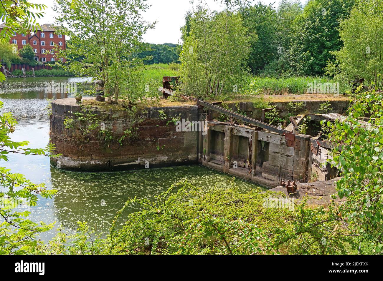 Abandoned lock gates at Walton Lock, into the Ship Canal, Walton, Warrington, Cheshire, England, UK, WA4 6DJ Stock Photo