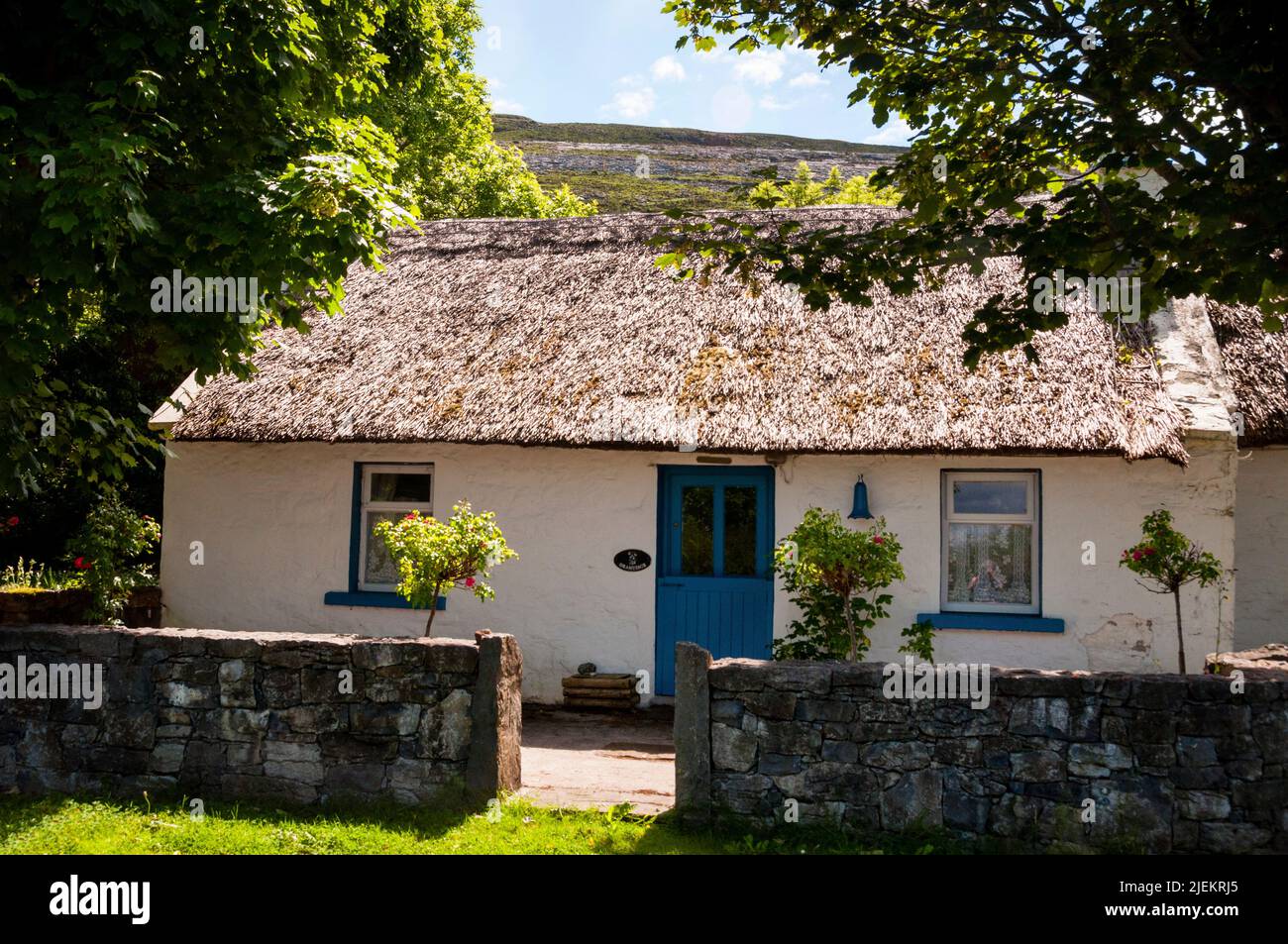 Irish thatched roof cottage in the seaport village of Kinvara, Ireland