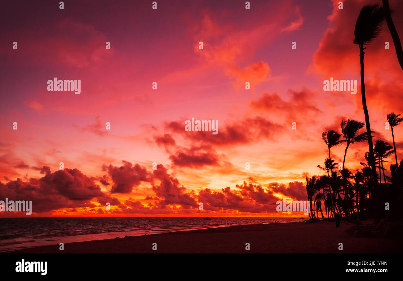 Coastal landscape with red tropical sunrise over Atlantic Ocean coast, Bavaro beach, Dominican Republic Stock Photo