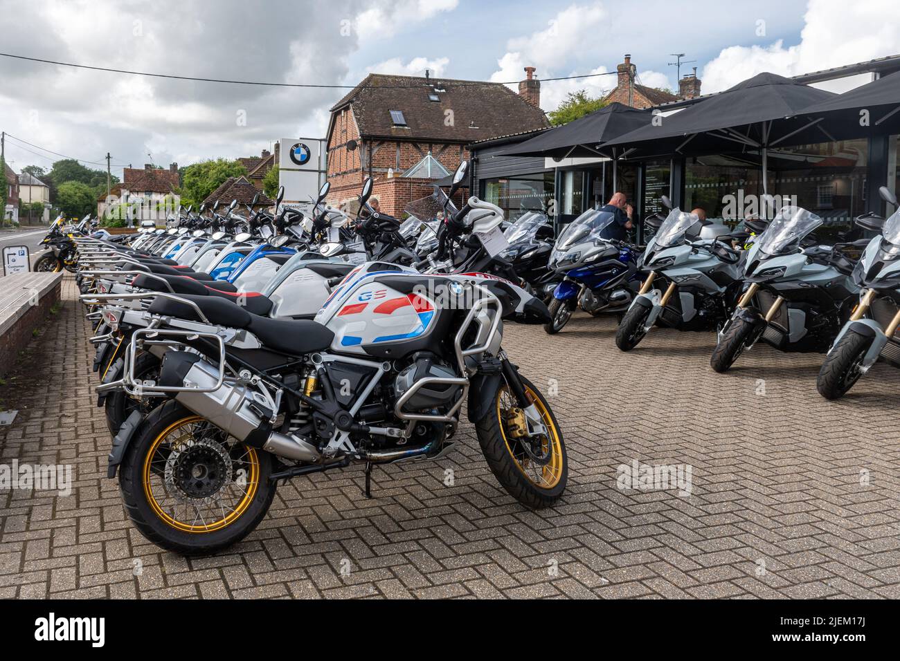 Bahnstormer Alton, BMW Motorrad retailer in Lower Farringdon, Hampshire, England, UK. Motorbikes motorcycles displayed on the forecourt. Stock Photo