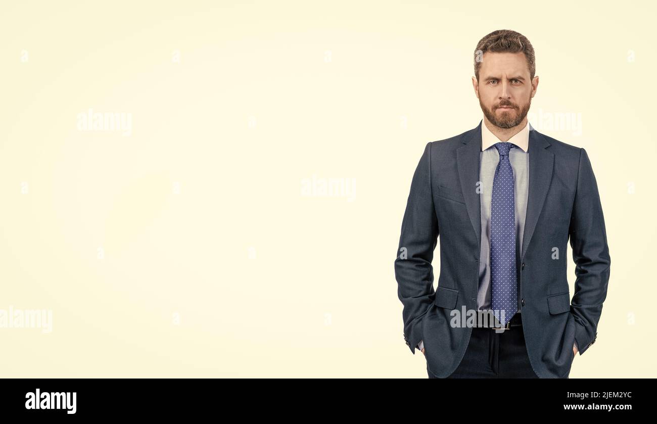 Serious professional man manager in formal wear isolated on white copy space, suit Stock Photo