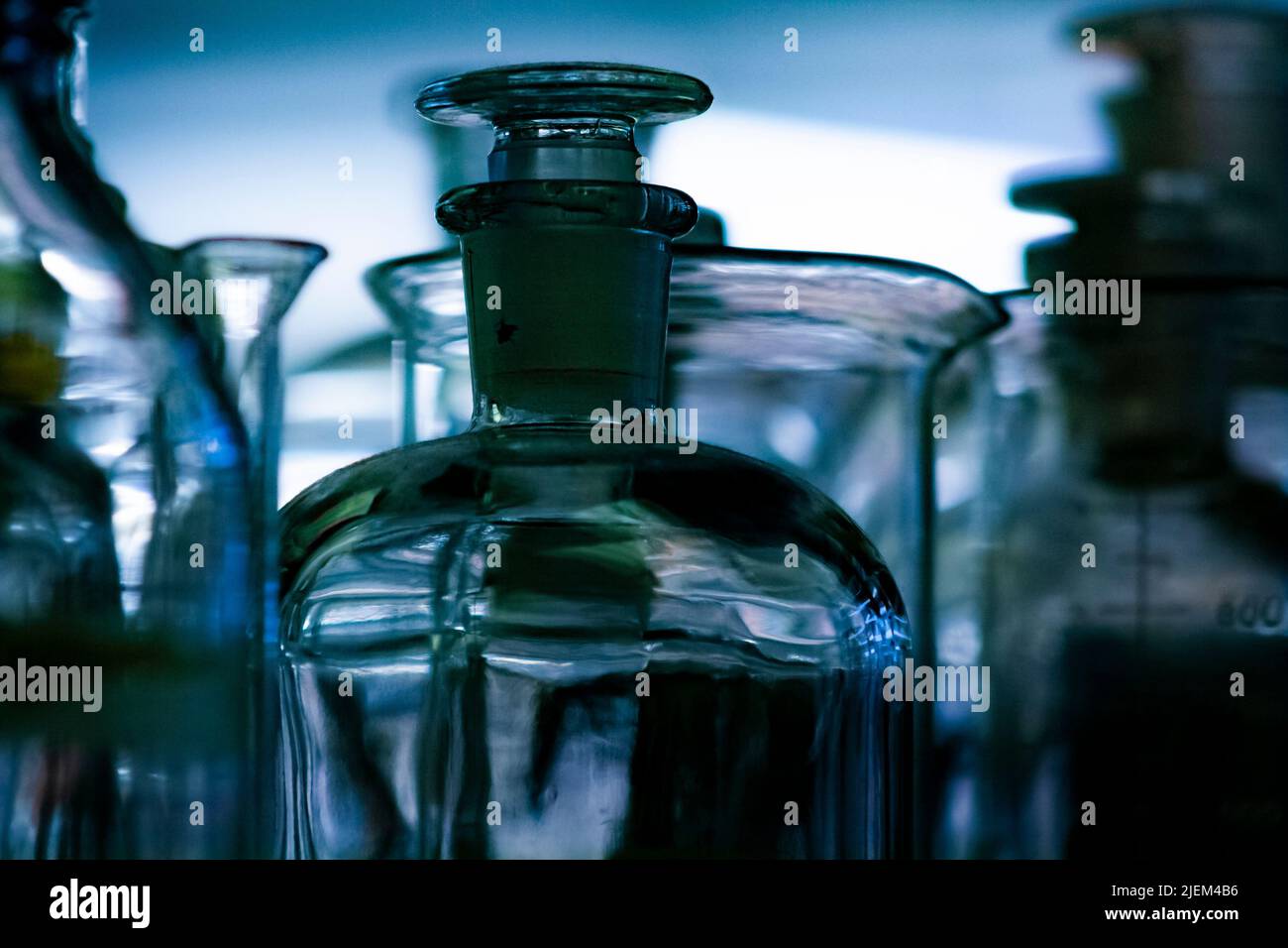 Laboratory glassware in a dark room Stock Photo Alamy